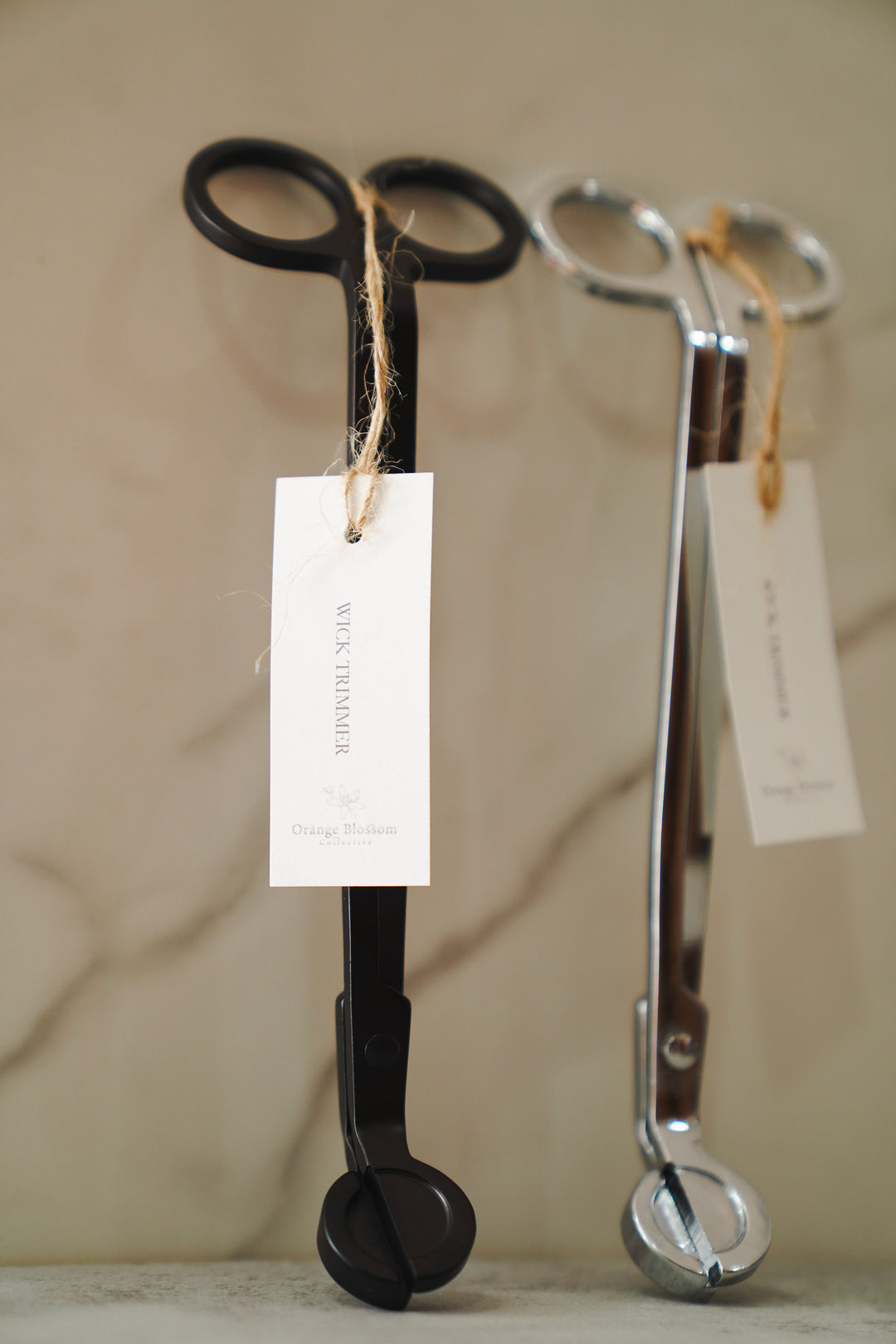 Black wick trimmer with looped handle,