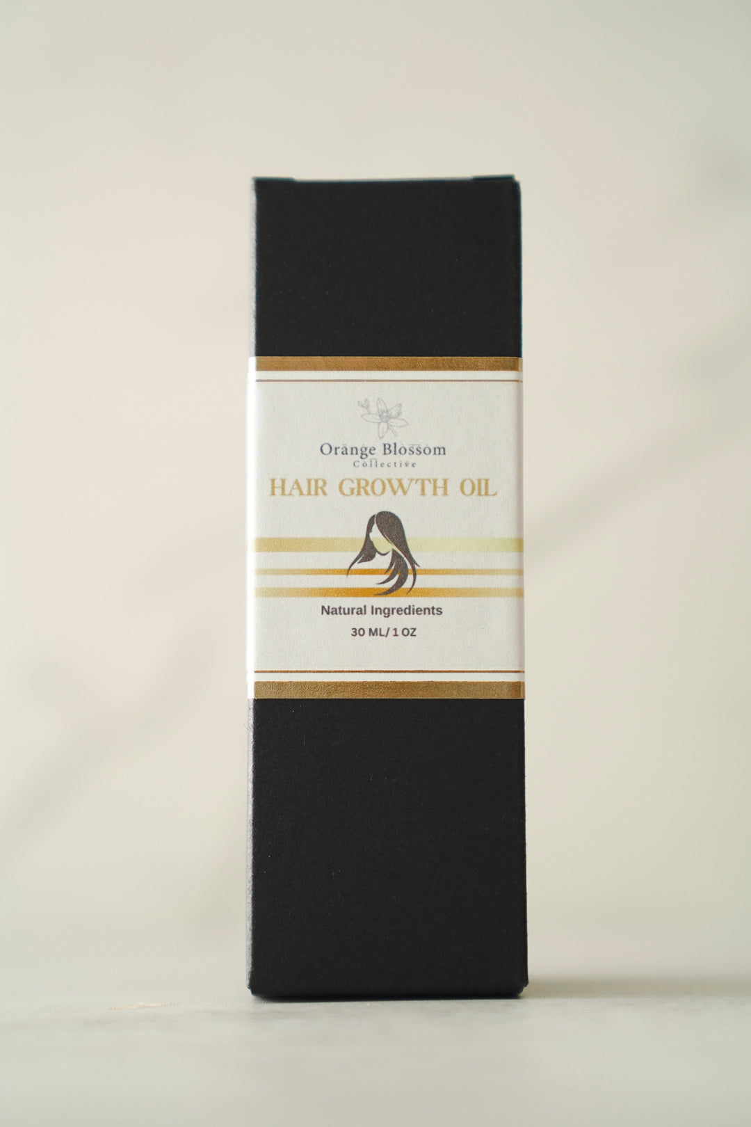 Orange Blossom Collective Hair Growth Oil box, front label with product details