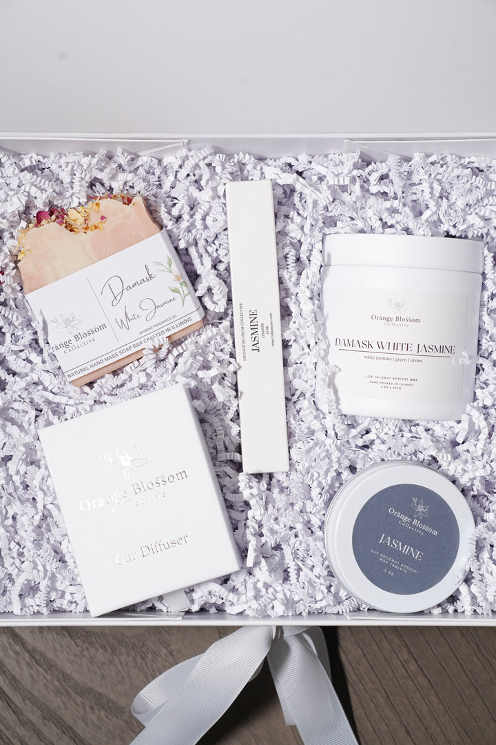 Damask Jasmine Luxe Box open flat lay candle cologne soap car diffuser wax melt white crinkle paper Orange Blossom Collective