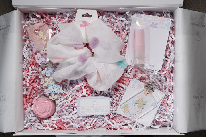 Little Luxe Box open white gift box pink crinkle paper handmade scrunchie roll on lip balm lotion keychain bookmark kids OBC Illinois