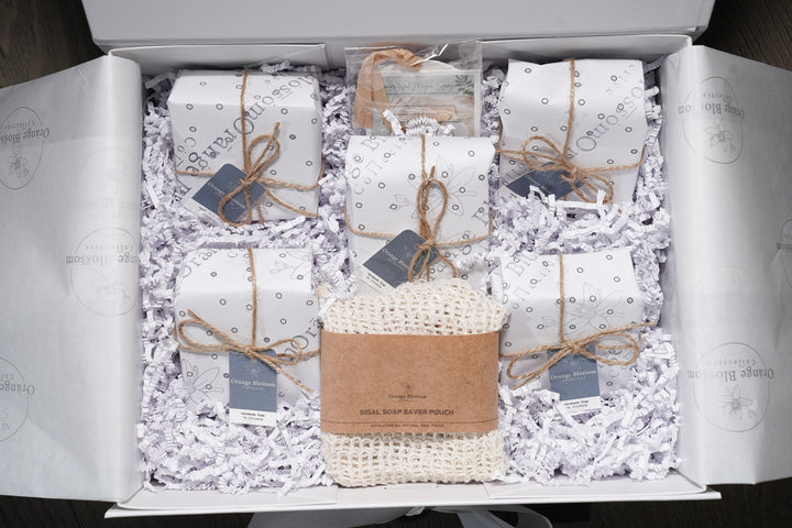 The Luxe Soap Collection white gift box 5 handcrafted OBC soap bars natural sisal mesh bag magic sponge grey crinkle paper Illinois