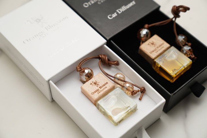 OBC Car Diffuser white box and black box open jasmine amber oud orange blossom fragrance oil handmade Illinois